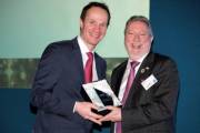 Stuart Robinson receives his award